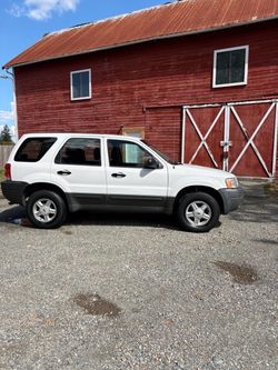 2003 Ford escape great commuter 27 MPG‘s