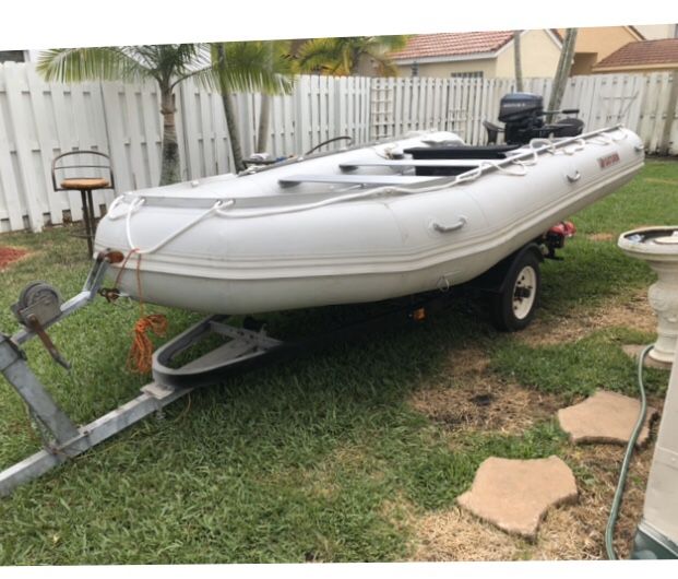 Inflatable boat with trailer and motor