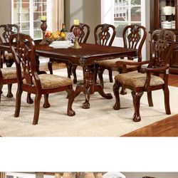 Dining Table With 8 Chairs And An Extender 