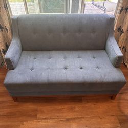 Living Spaces MCM tufted navy loveseat