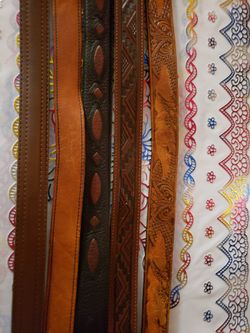  Assortment Of Mens Leather belts  Designs. 44 Inches Long Some With Buckles Some Without  $  7.00  Each 