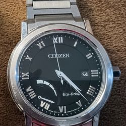 Citizen Eco-Drive Watch Black Face with Stainless Steel Body & Band.