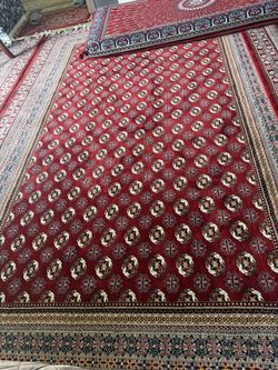 Three very popular Turkish carpets in red Its dimensions are two meters and its length is three meters.