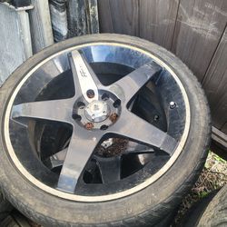 Early scion xb rims and tires.   4 total