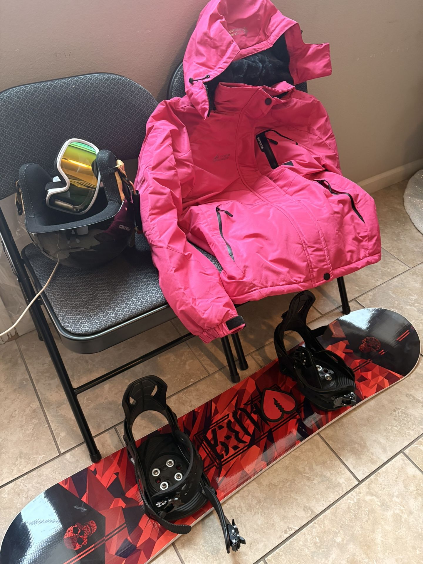 Kids Snowboard, Helmet, Goggles And Large Jacket.