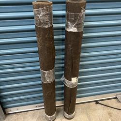 Two Rolls Of Roofing Paper