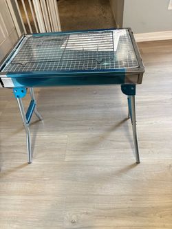Portable stainless steel barbecue grill