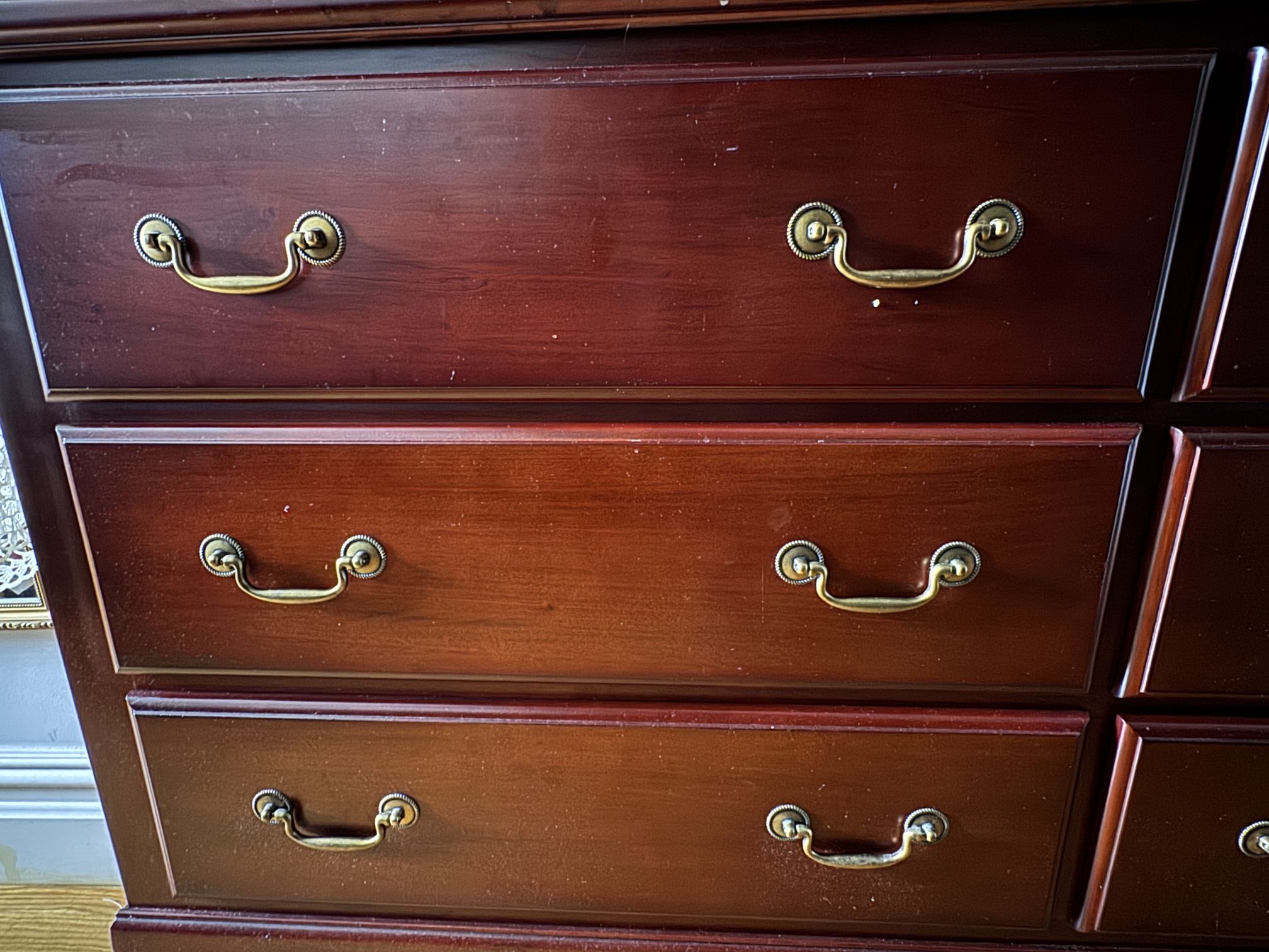 Solid wood 6 drawer dresser with mirror Bob’s Discount Furniture cherry red in excellent condition