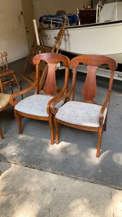 Two Wood Captain Chairs