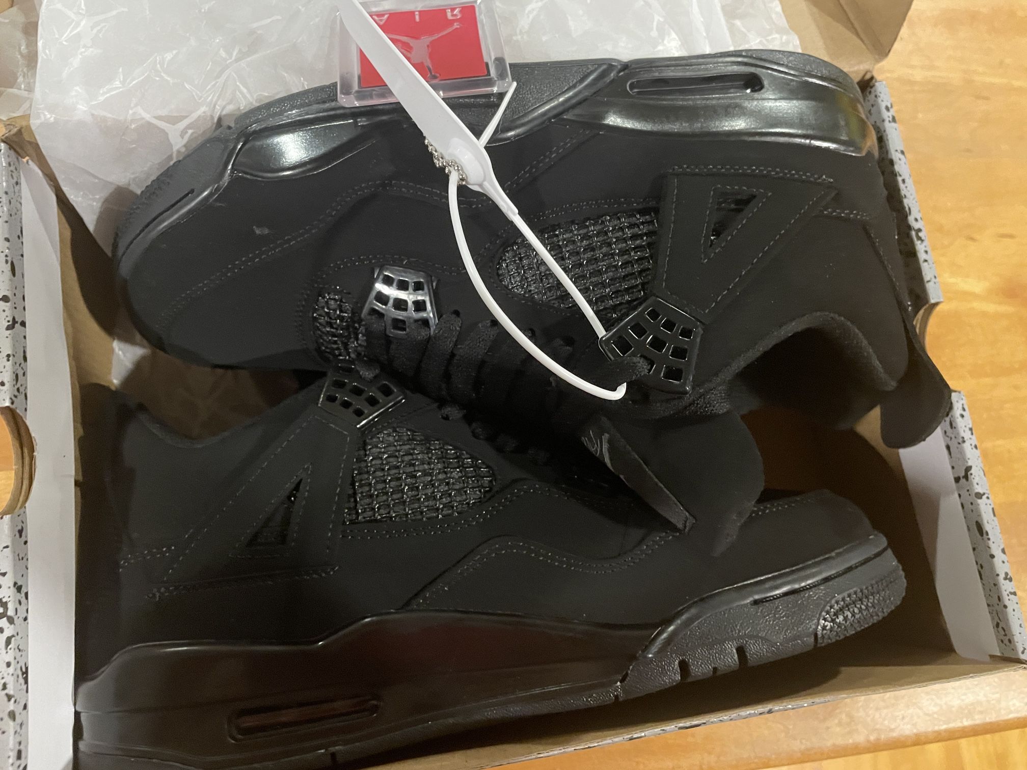 Jordan 4 Black Cats 
