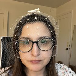 Elegant Cream Veil with bow & poofs