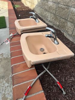 Vintage 1958 rose colored matching sinks and bathtub
