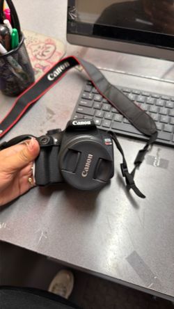 Canon camara with accessories and bag