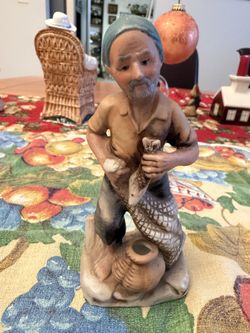 Vintage porcelain fisherman figurine, 6”, made in Korea