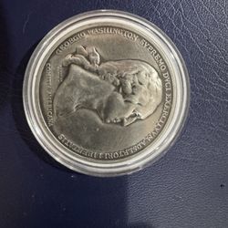 This is a George Washington pewter medal.
