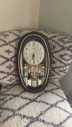 Small world RYHTHM clock