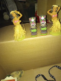 Totem Poles And Hawaiian Dancers 