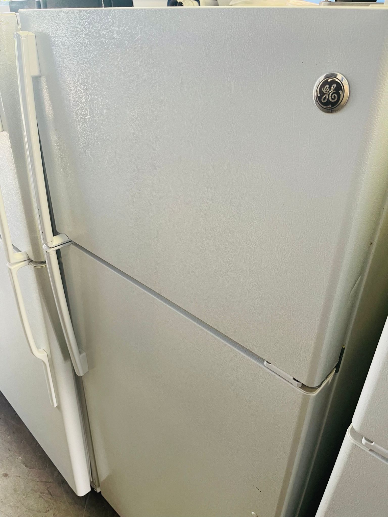 Ge top freezer refrigerator