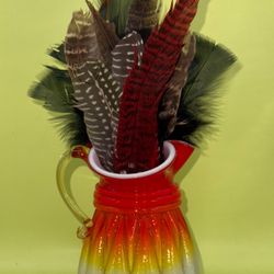 Vintage Kanawha Glass Co. Amberina Cased Milk Glass Pitcher with a ruffled rim.