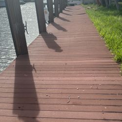Composite wood decking. 800 sf at $2.50 per  sf, used, normal wear, Prices per sf, Total Is $ 2,000
