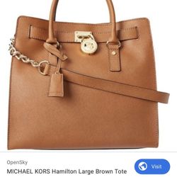  Authentic Michael Kors Hamilton tote in classic luggage/cognac brown leather with gold-tone hardware. Features the signature MK lock charm, structure