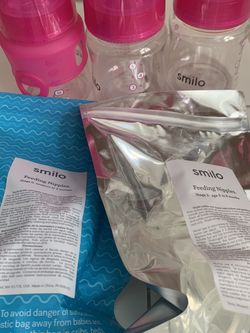 3 Smilo baby Bottles And New nipples