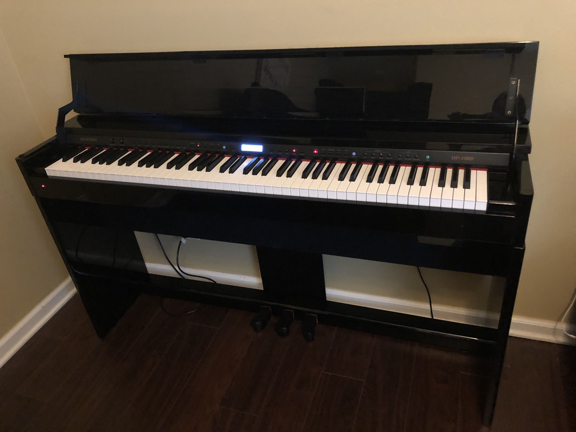 Negotiable Suzuki DP 1000 digital piano excellent condition beautiful sound no bench Make an offer