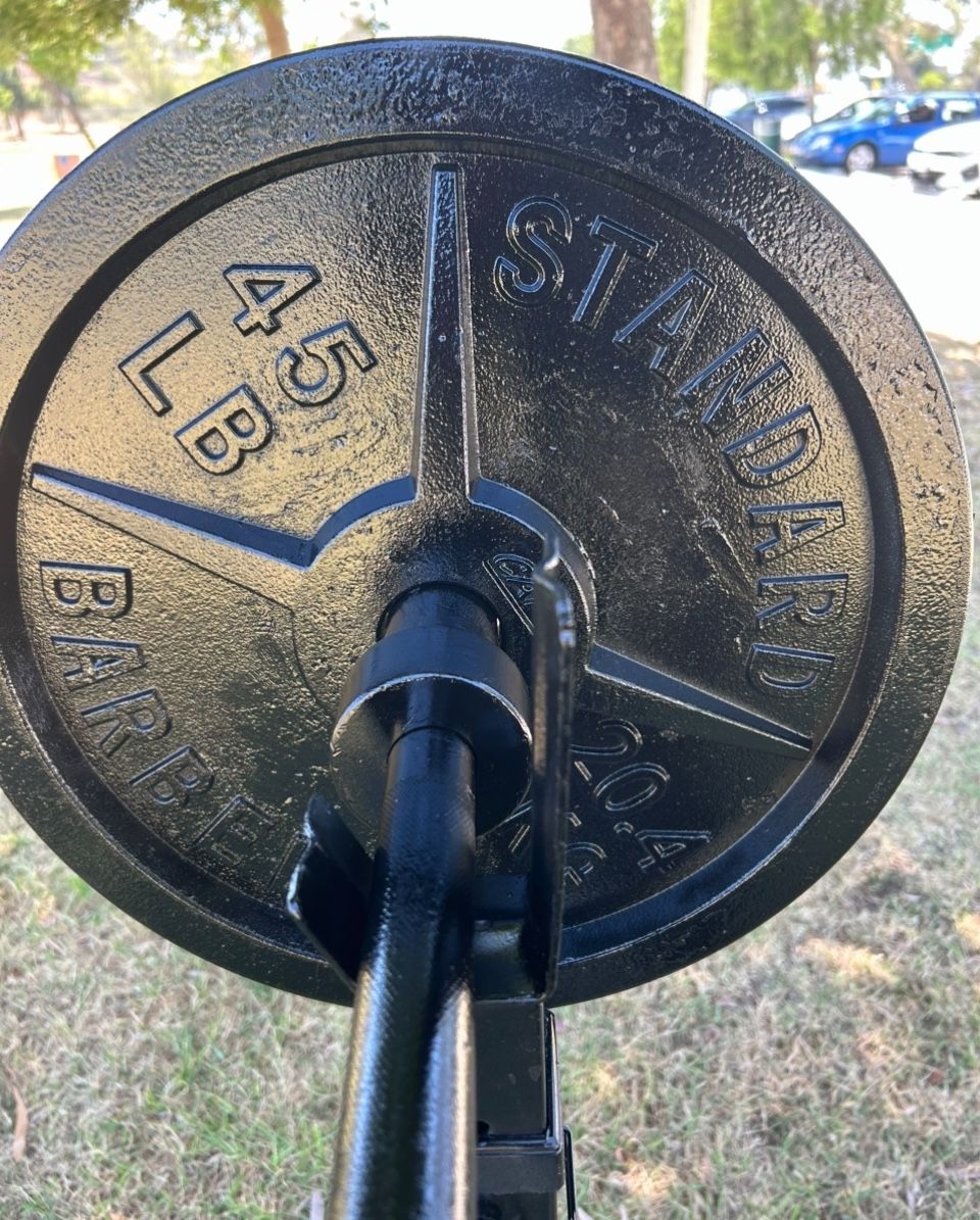 45 Lb Plates / Olympic Bar & Squat Rack 