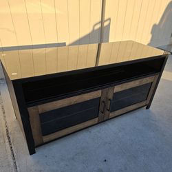 Contemporary Entertainment Center for Living Room for TVs up to 55" with Sliding Doors and Shelves