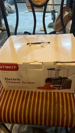 Electric cheese grater
