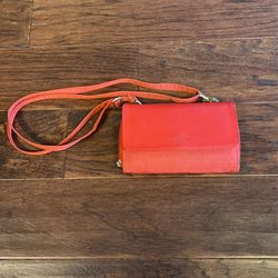 Small red Baggallini clutch