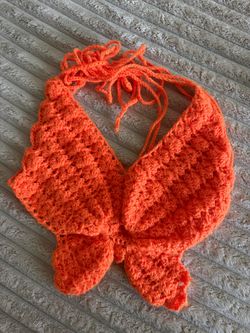 Cute Orange Butterfly crochet halter top with a beautiful textured pattern and adjustable tie strings.