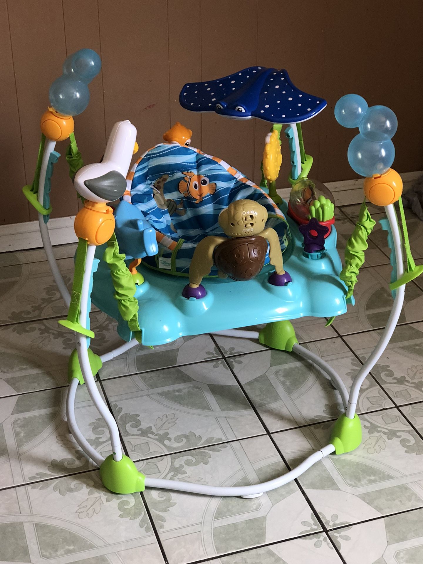 BRAND NEW FINDING NEMO BABY ACTIVITY JUMPER MUSIC LIGHTS AND SONGS WORKS!!!!
