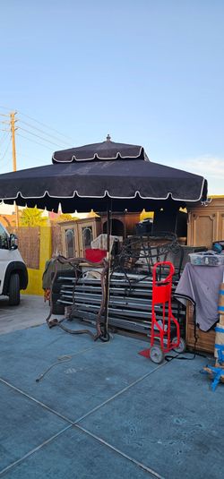 Black Two-Tier Patio Umbrella kingdom style ,Sunbrella huge 8x8 used good condition no stand