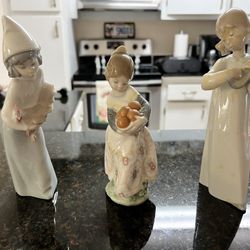 Lladro Three Miniature People