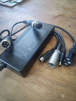 AC POWER CHARGER WITH 3 PIN FEMALE CONNECTOR 5 IN 1 ADAPTER DIFFERENTS MODELS FOR ELECTRIC BIKE & SCOOTER 54.6 VOLTS - 2A CHARGING BATTERY 48 VOLTS