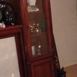 2 curio cabinets