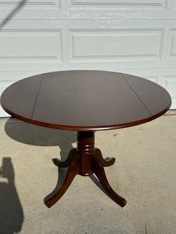 Round dining table and chairs