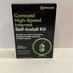 The image shows a Comcast High-Speed Internet Self-Install Kit, which is a vintage or collectible item.  It