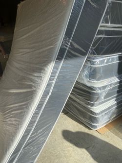 Queen Pillowtop Mattress and box spring new in plastic free delivery in Atlanta