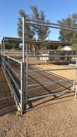 Horse corral with sheeted roof