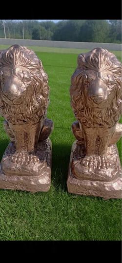 Large Newly made Solid concrete lion statues/ price is for both/free delivery