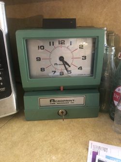 Punch clock with key