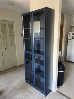 Dark Blue IKEA BILLY Bookcase With Doors for Sale in Auburndale