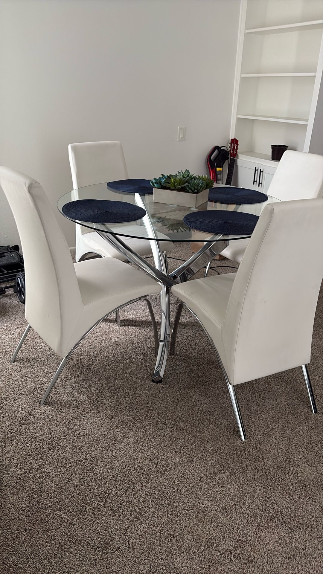 Donning Set One Round Table And Four While Faux Leather Chairs