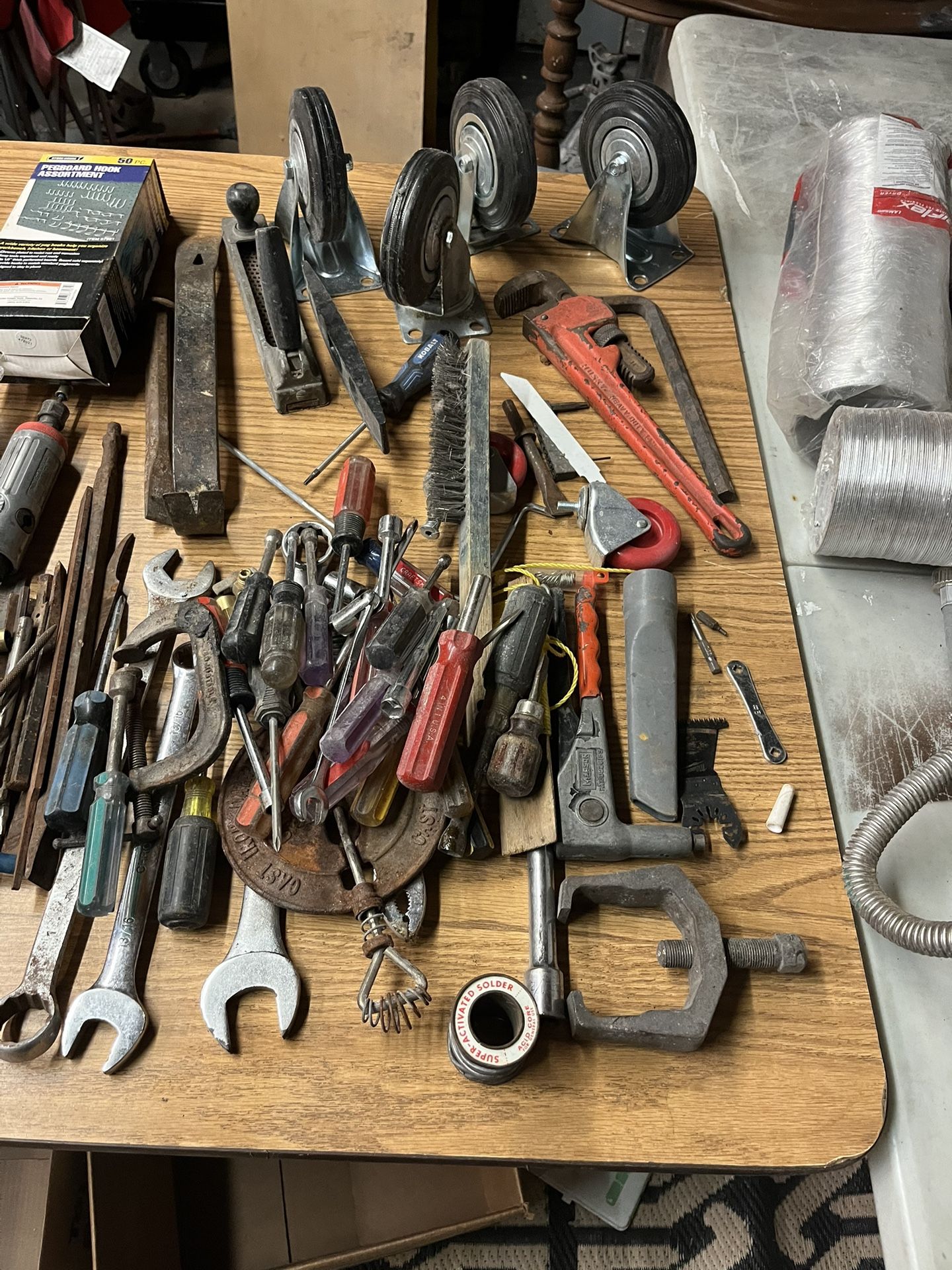 Huge garage sale, tools, antique figurines, China, silverware, and much more basketball cards, antique clocks, anything and everything