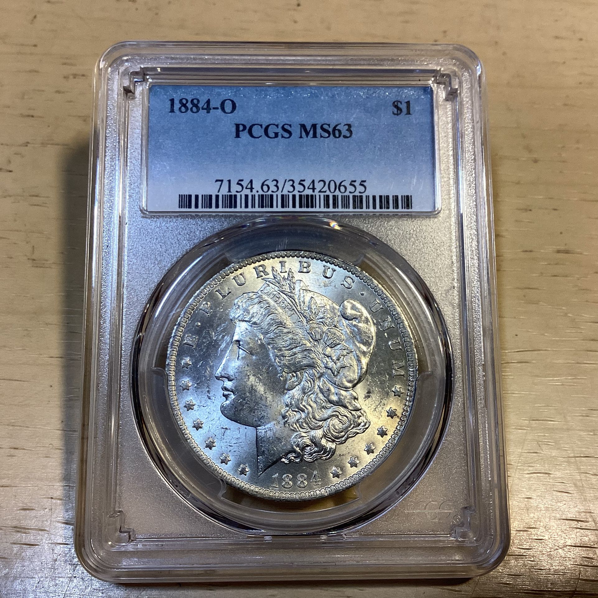 Graded 1884 O Morgan Silver Dollar