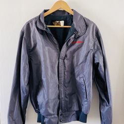 Vintage Harley Davidson bomber jacket. Great Condition but please remember this is a vintage item. Light weight and the tag is blurry it’s seem to fit