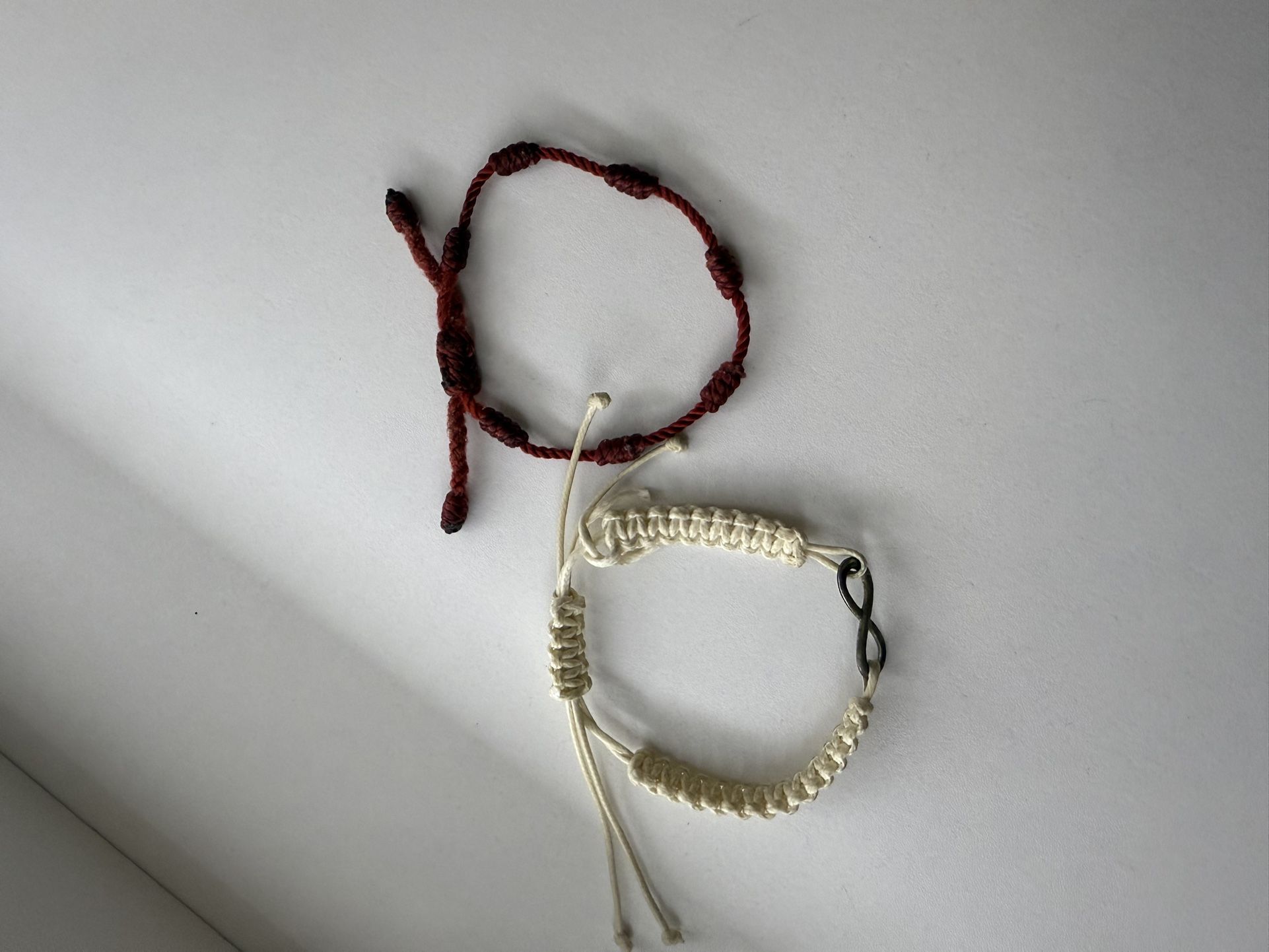 White and Burgundy Bracelets