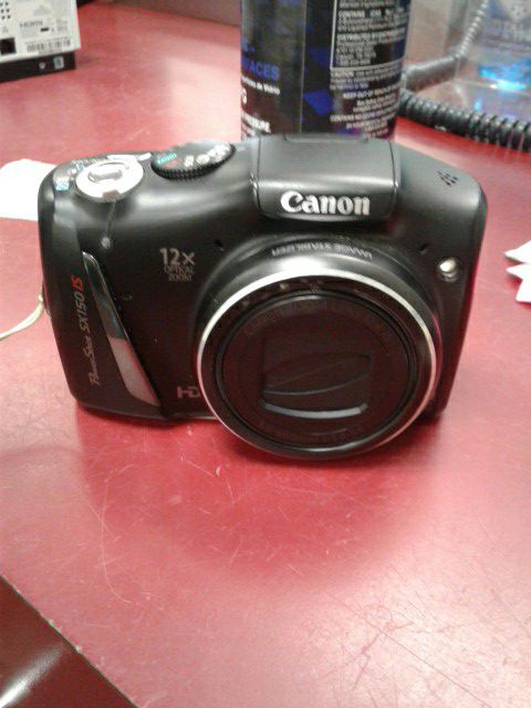 Canon PC1677 14.1 MP digital camera w/ 12X optical zoom. Inv # 96091357390